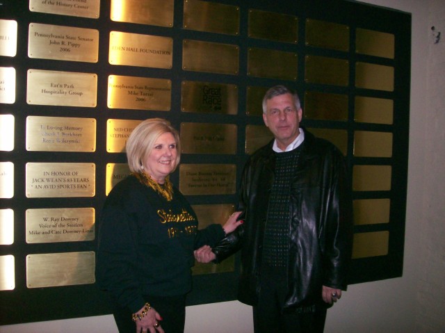 Barb and Ken in front of Diane's plaque